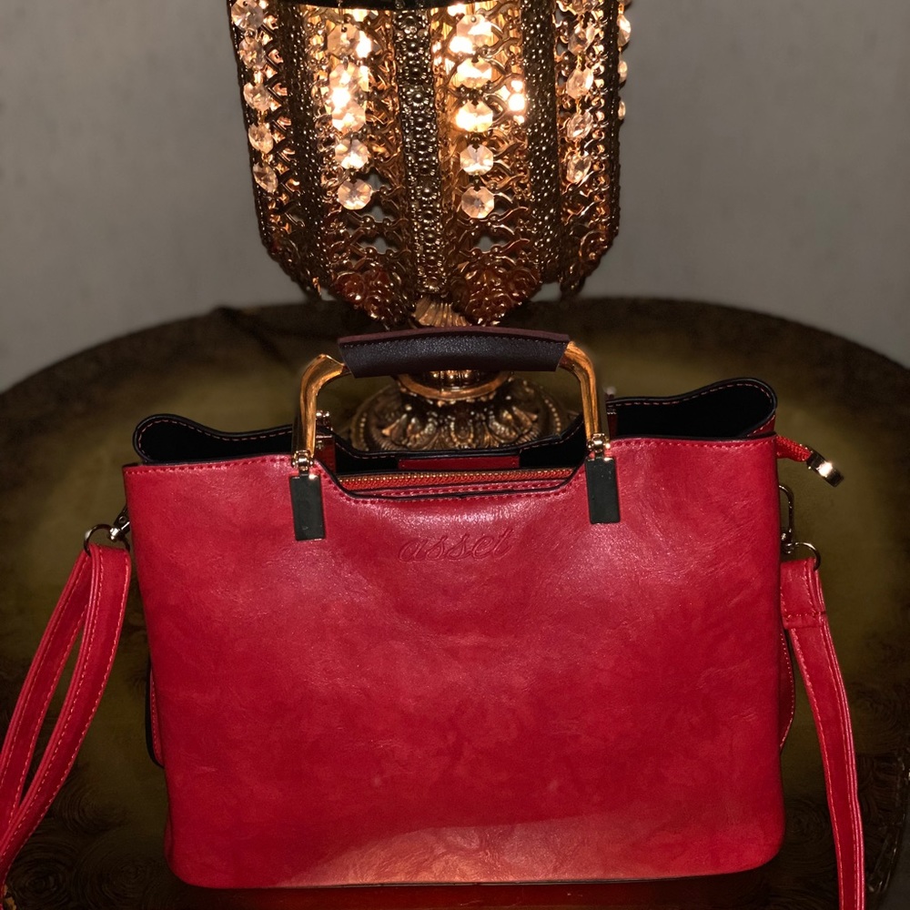 Assets Charlie red handbag.